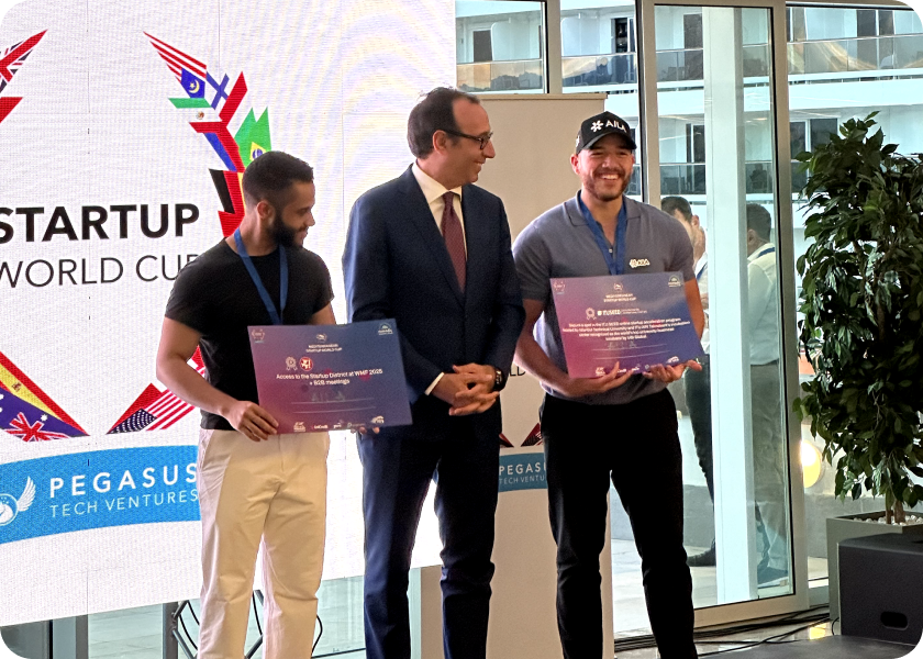 AILA team receiving award at the startup world cup in palermo, Italy